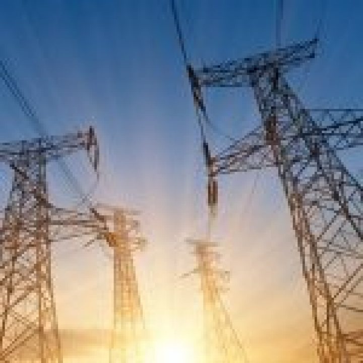 CustomerCareMC Industries EnergyChemicalsUtilities_OilTowers Electric Towers Against Sunlight