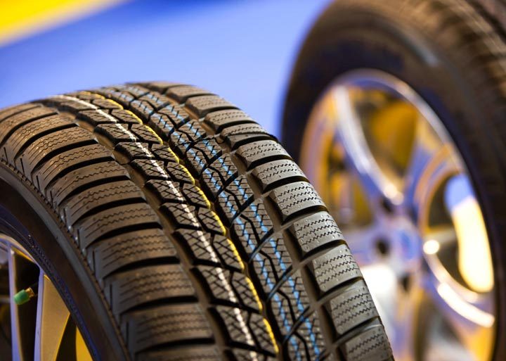 CustomerCareMC_Industries_Automotive Image of tires with tread and hubcap